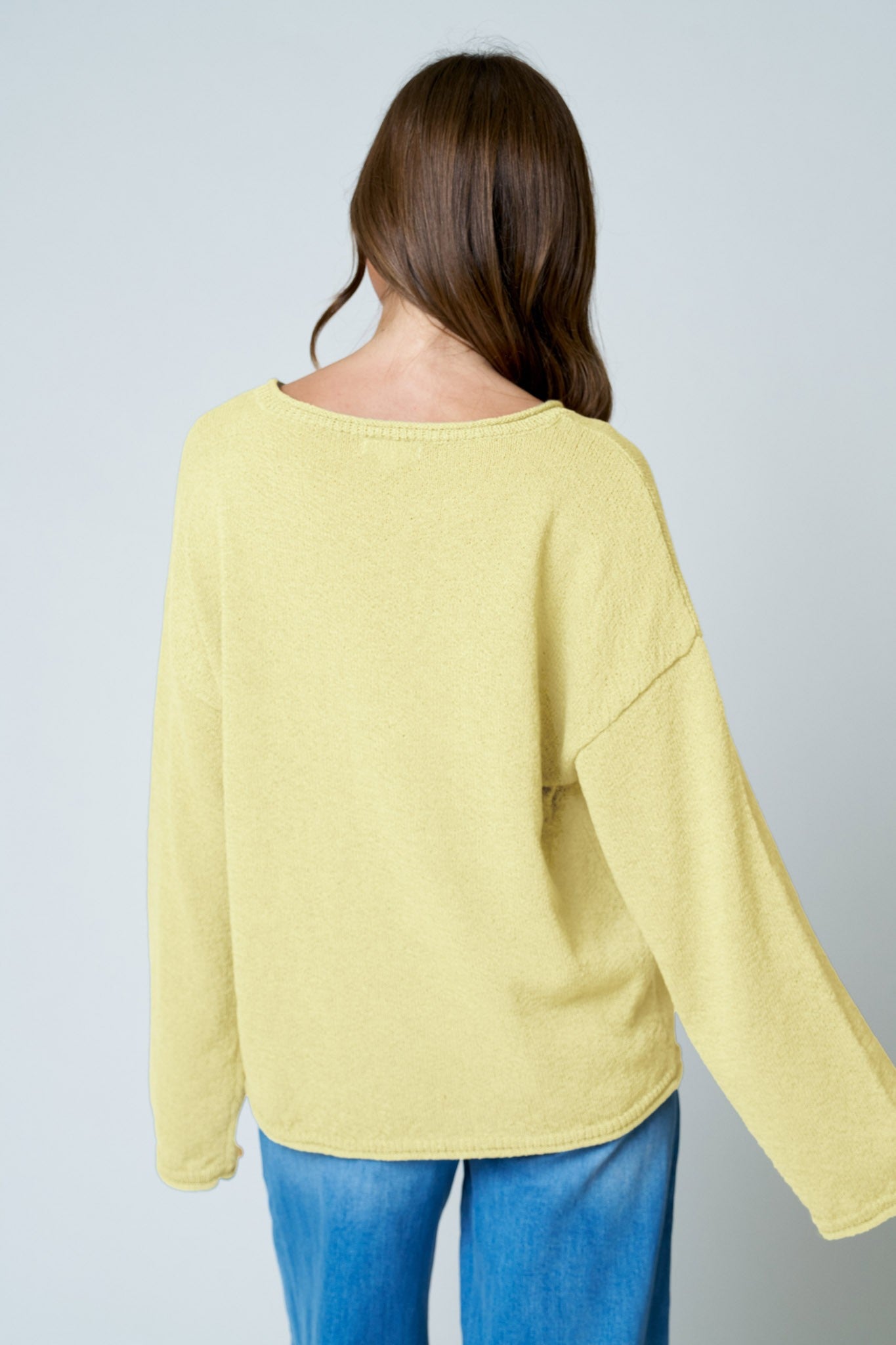 Textured Raw Edge Long Sleeve Knit Sweater in Butter Yellow