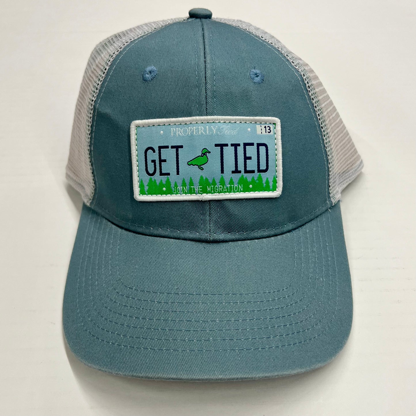 Get Tied Trucker Hat