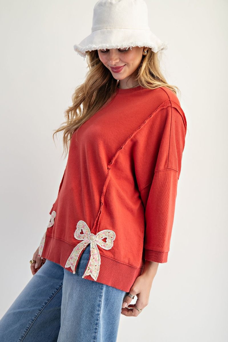 Terry Knit Top with Applique Bows on Hem in Boho Red